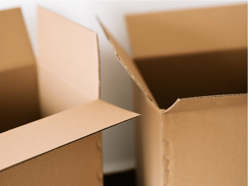What's the difference between cardboard and corrugated cartons?