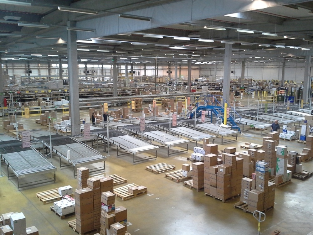 Logistics warehouse with packages and cardboard boxes