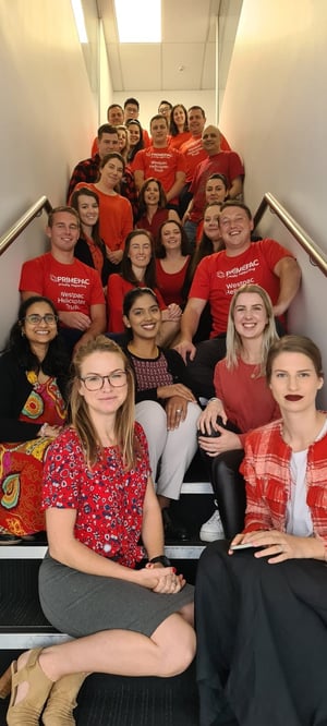 The Primepac team wearing red for the Auckland Rescue Helicopter Trust